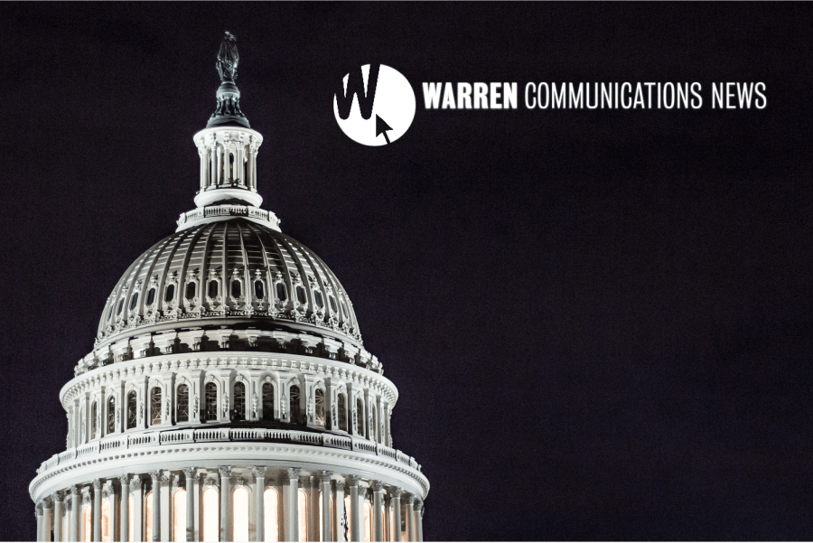 Image of US capitol with Warren Communication News Logo in dark sky