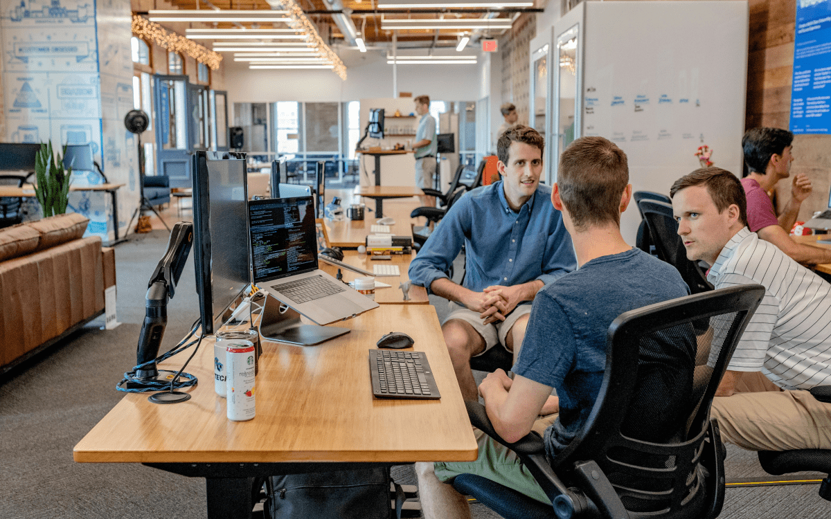 Men in an office talking