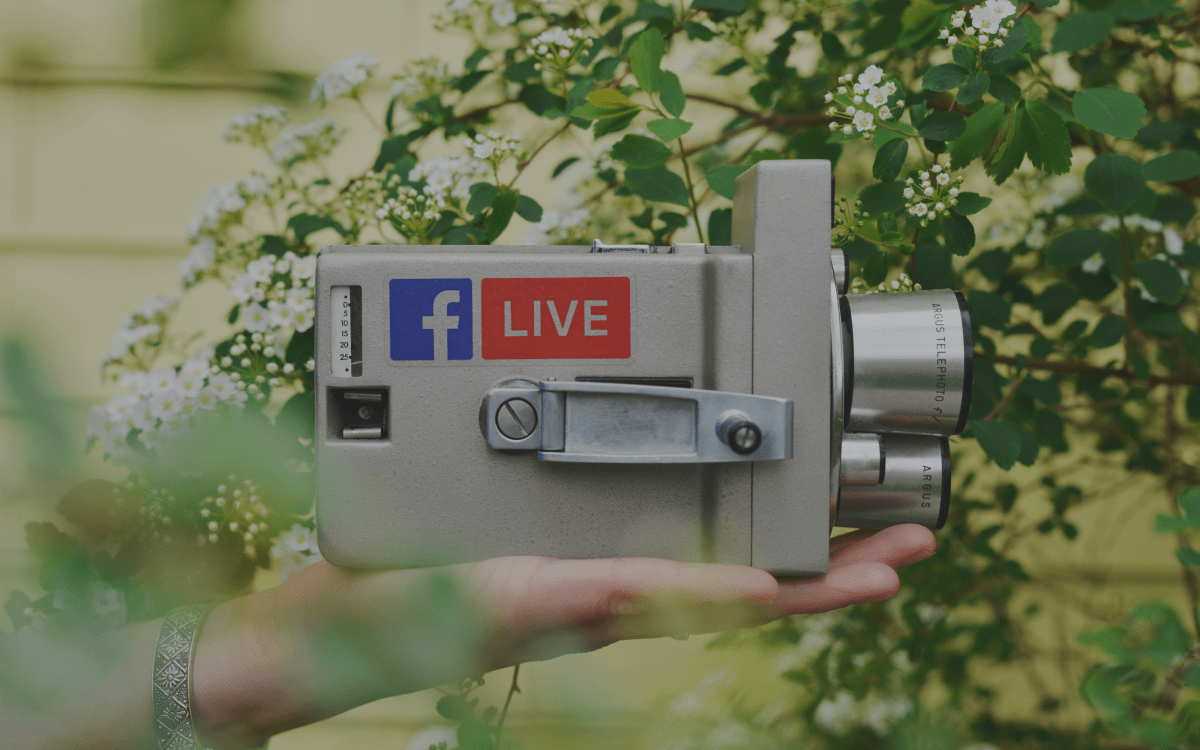 Old school camera with facebook live logo